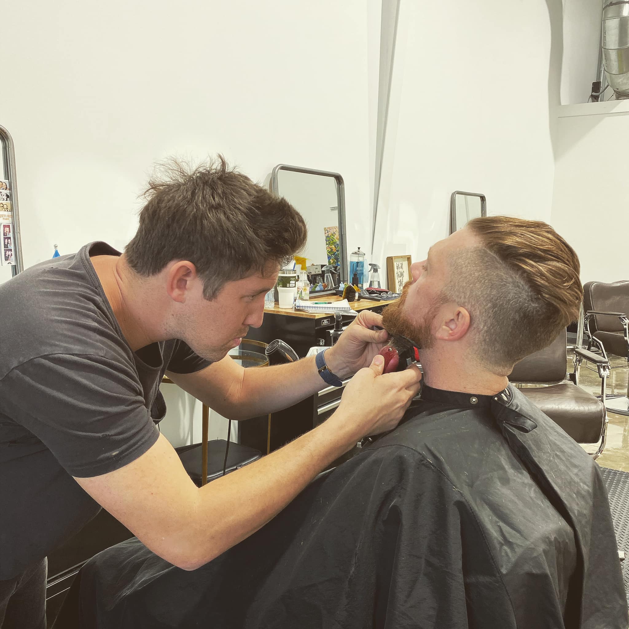 Man getting his beard trimmed at The Humbleman Men's Studio